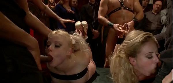  Caged blonde slaves are group fucked